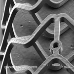 A close up of the tire tread pattern on a car.
